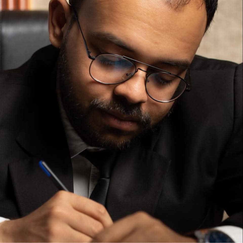 Adv. Debagni Chowdhury Reviewing Documents